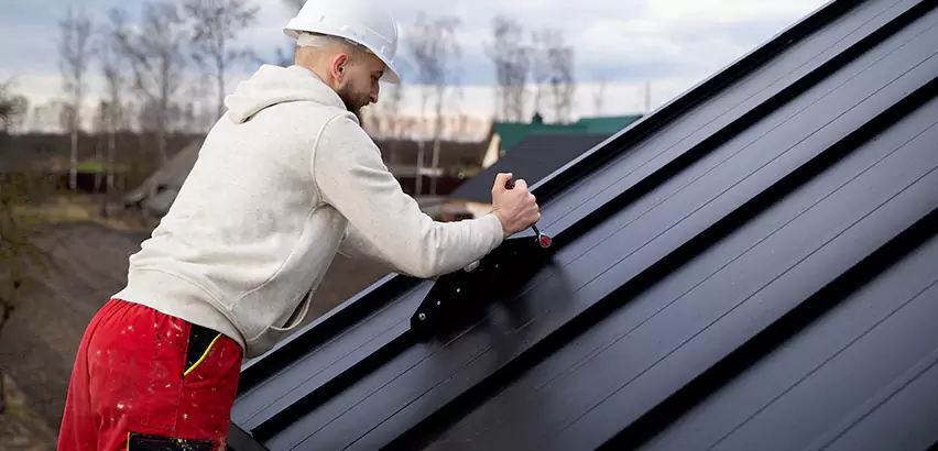 Tin Roof Ridge Cap Installation in Kenosha